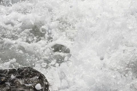 Splashes from sea waves Stock Photos