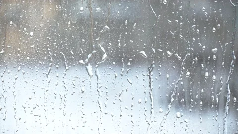 Splashes of water droplets on the glass. Window on a rainy day. Stock Footage 146180101