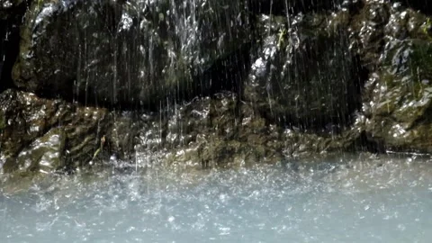 Splashes of water falling into the river Stock Footage 336828539