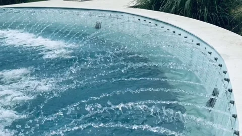 Splashes of water in the pool as a background Stock Footage 274726558