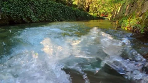 Splashes of water in sun light 스톡 동영상 310300355