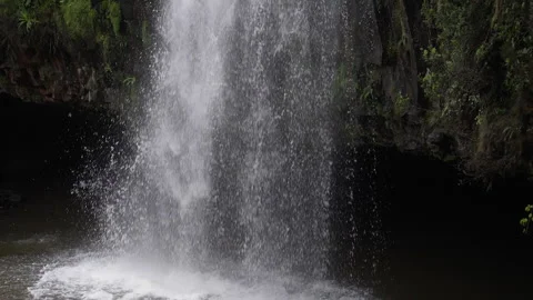 Splashes of water waterfall camera movement down close shot in slow motion Stock Footage 276596531