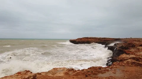 Splashes of water from the waves breaking on the stones, Storm Sea with waves Stock Footage 122323569