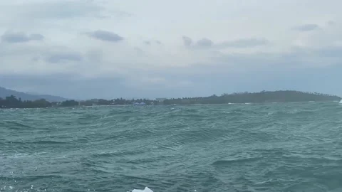 Splashes from the waves fly crashing against the side of the boat. Stock Footage 236693609