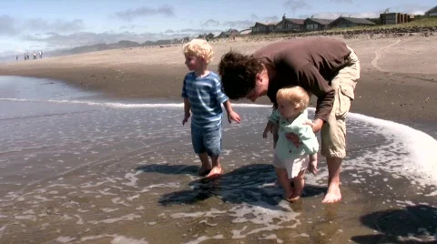 Splashing at the beach Stock Footage 536429