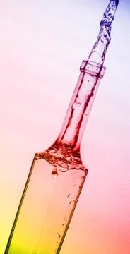 Splashing bottle Stock Photos