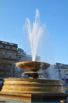 Splashing fountain Stock Photos