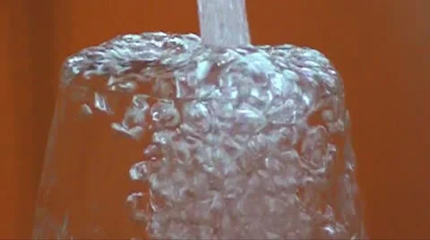 Splashing in a glass Stock Footage 10914893