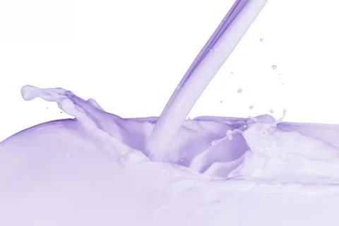Splashing milk Stock Photos