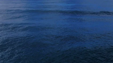 Splashing sea waves on deep blue ocean water surface,natural fluid motion 4k Stock Footage 119990313