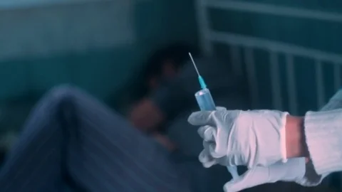 Splashing from the syringe Stock Footage 70961309