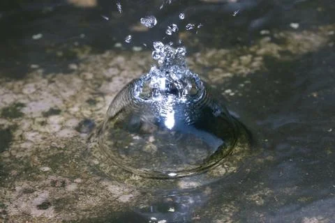 Splashing water bubble Stock Photos