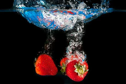 Splashing into the water Stock Photos