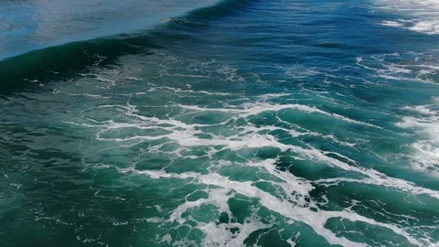 Splashing waves motion,aerial view over deep blue sea water,natural phenomenon Stock Footage 119984775