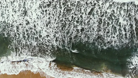 Splashing waves motion,aerial view over gradient turquoise blue sea water,4k Stock Footage 120028184