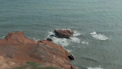 Splashing Waves Of Saint Lawrence River On The Sea Stack By The Magdalen Stock Footage 139273145