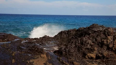 Splashing waves striking the rock Stock-Footage 43165678