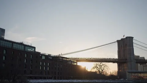 The splendid Brooklyn Bridge seen at Sunset alongside the iconic New York City 스톡 동영상 314571827
