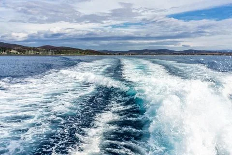 Splendid panoramic view of the crystal blue sea.Motor boat in the sea. Travel Stock Photos