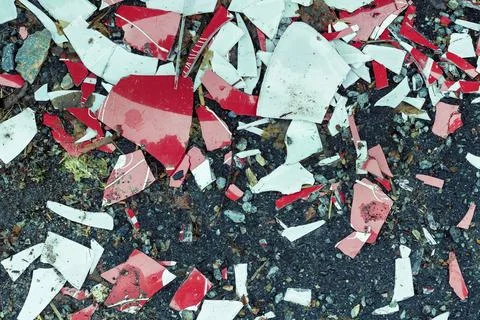 Splinters of a ceramic tile . Texture white pieces, shards against a dark b.. Stock Photos