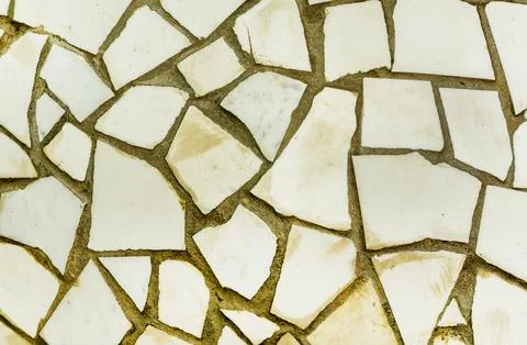Splinters of a white ceramic tile . Texture white pieces, shards against a .. Stock Photos