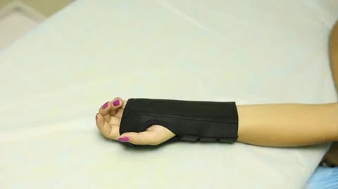 Splints on his arm Stock Footage 45860537