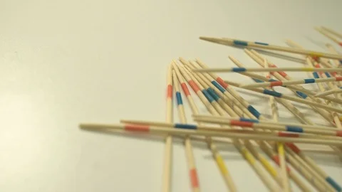 Splints of the micado game fall on a white shelf 스톡 동영상 127051878