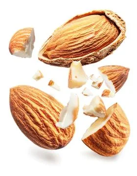 Split almond shell with almond pieces and almond butter Stock-Fotos