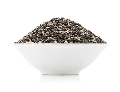 Split Black Lentil on White Background Stock Photos