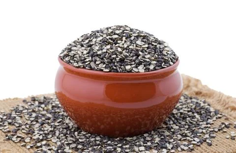 Split Black Lentil on White Background Stock Photos