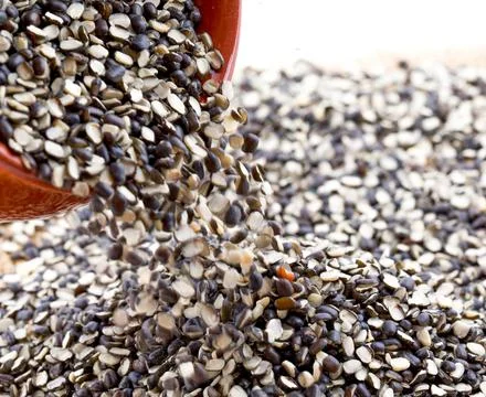 Split Black Lentil on White Background Stock Photos
