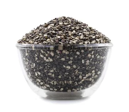 Split Black Lentil on White Background Foto stock