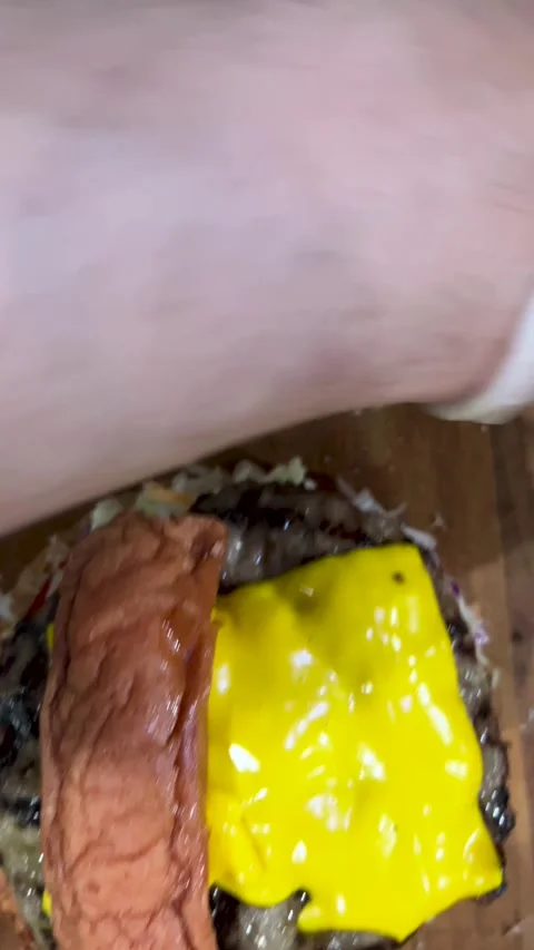 Split burger view with the top and bottom halves shown separately. Bottom featur Stock Footage 309655833