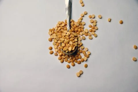 Split Chana Dal Angled Top View Texture on White Defocus Background Macro P.. Stock Photos