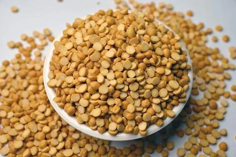 Split Chana Dal in Bowl Angled Top View with Blurred Background Foto stock