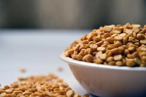 Split Chana Dal in Bowl Front View Texture with Defocus Background Macro Ph.. Stock Photos