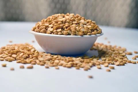 Split Chana Dal in Bowl Front View Texture with Defocus Background Macro Ph.. Stock Photos