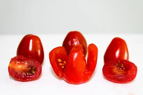 Split Cherry Tomatoes Background Stock Photos