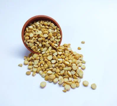 Split Chickpea in a bowl Also Know as Chana Dal, Yellow Chana Split Peas, D.. Stock Photos