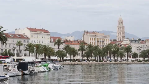 Split Cityscape and Seaside Promenade, Mountain Landscape Background, Pan Stock Footage 202892497