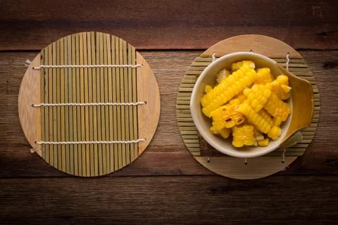 Split corn on wood background Stock Photos