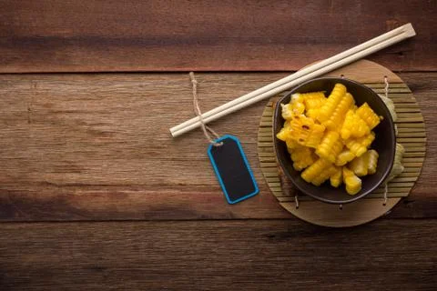 Split corn on wood background Foto stock