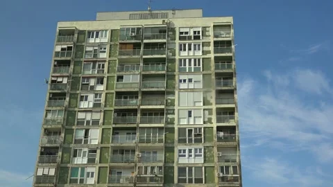 SPLIT, CROATIA - 2023 - Establishing shot of an old rundown high rise apartment Stock Footage 264609749
