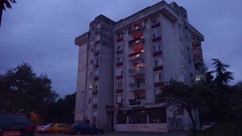 SPLIT, CROATIA - 2023 - Establishing shot of an old rundown high rise apartment Stock Footage 264612518