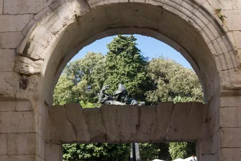 SPLIT, CROATIA - AUGUST 11 2017: The statue of Gregory of Nin in Split behind Stock Photos
