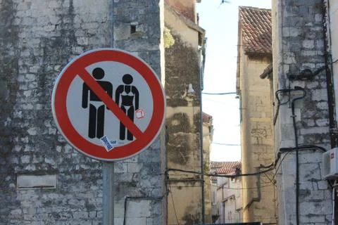 SPLIT, CROATIA - AUGUST 11 2017: Strange road sign in Split, Croatia, with th Stock Photos