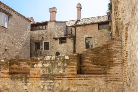 SPLIT, CROATIA - AUGUST 11 2017: Architectural feature of the ruined walls of Stock Photos
