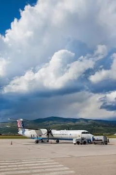 Split, croatia - jun 6: croatia airlines dash 8 q400 parked on a runway  Stock Photos