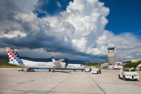 Split, croatia - jun 6: croatia airlines dash 8 q400 parked on a runway  Stock Photos