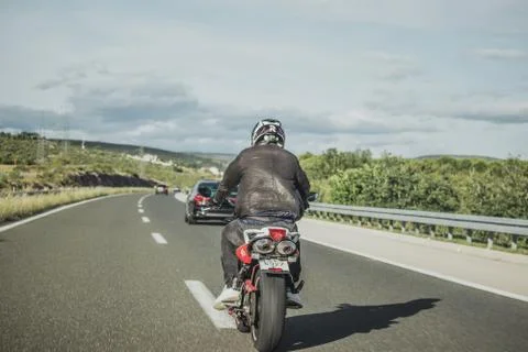 Split, Croatia June 2020 Driver on Yamaha Fazer motorbike, white and red Abar Stock Photos